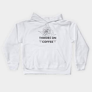 Thrives on coffee (black and white) Kids Hoodie